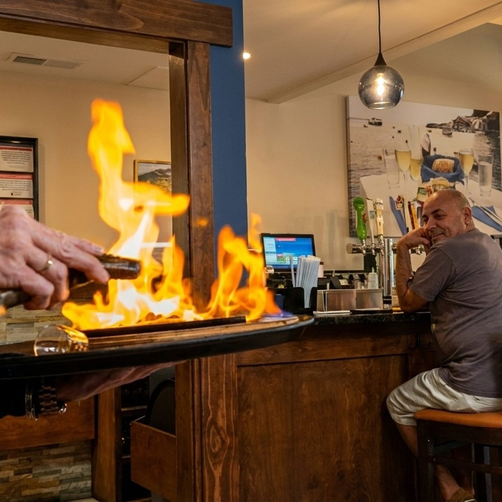 Authentic Greek Food, Craft Cocktails, Fire.